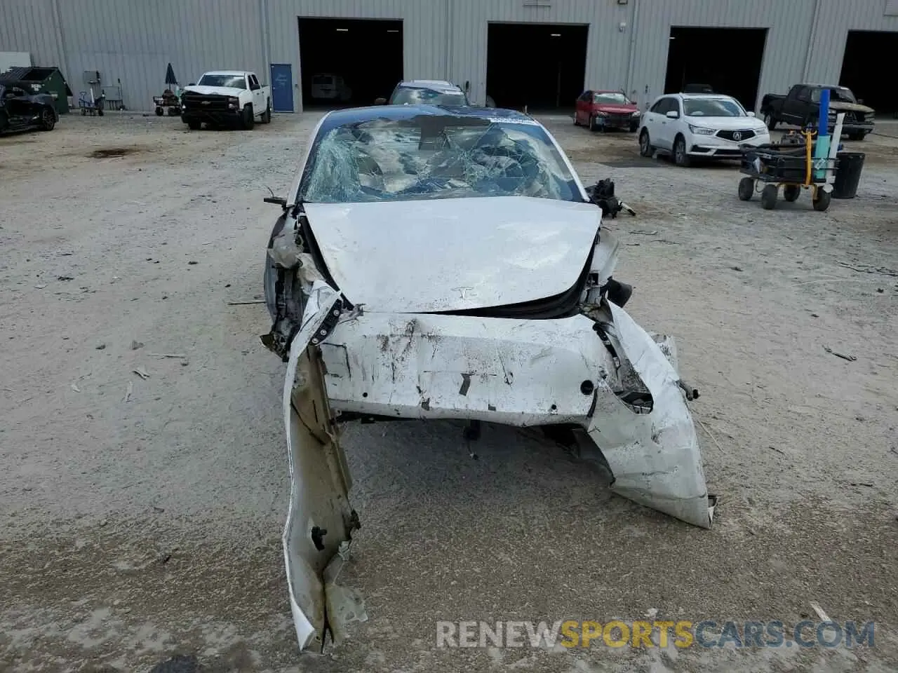 5 Photograph of a damaged car 5YJ3E1EA3MF976870 TESLA MODEL 3 2021