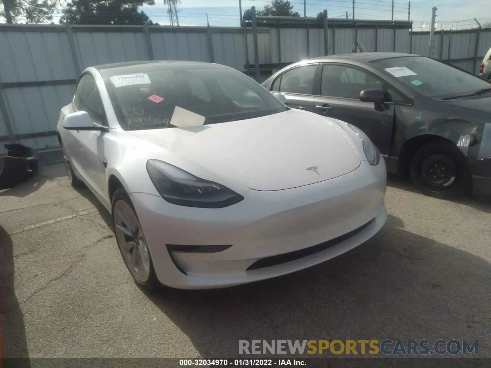 1 Photograph of a damaged car 5YJ3E1EA3MF977873 TESLA MODEL 3 2021