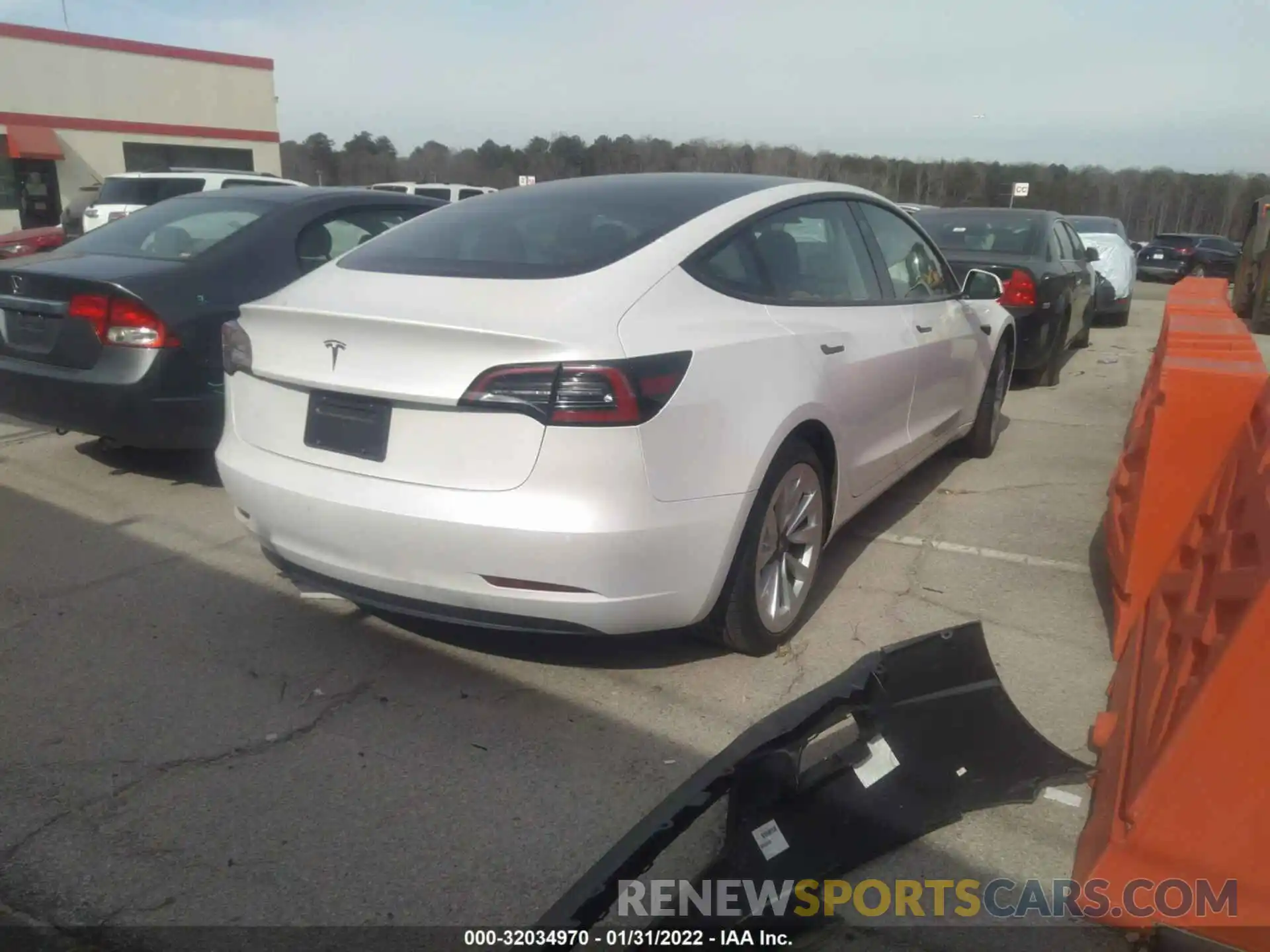 4 Photograph of a damaged car 5YJ3E1EA3MF977873 TESLA MODEL 3 2021