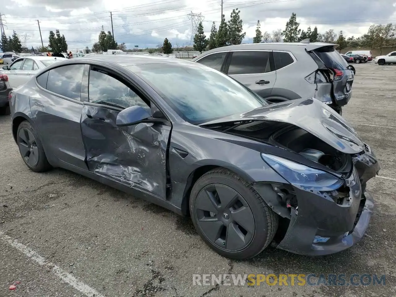 4 Photograph of a damaged car 5YJ3E1EA3MF982443 TESLA MODEL 3 2021
