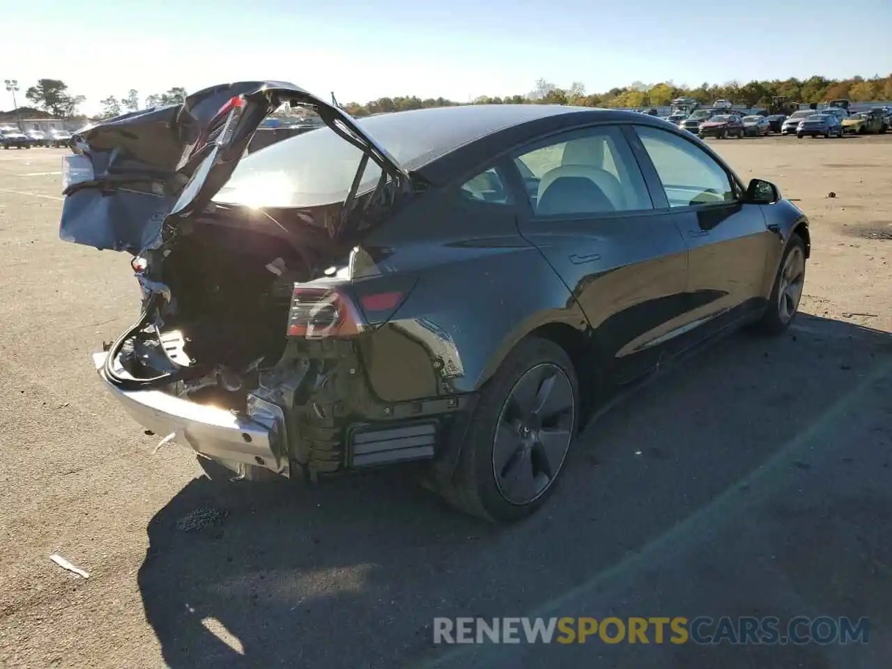 4 Photograph of a damaged car 5YJ3E1EA3MF989506 TESLA MODEL 3 2021