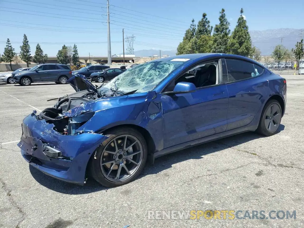 1 Photograph of a damaged car 5YJ3E1EA3MF996973 TESLA MODEL 3 2021