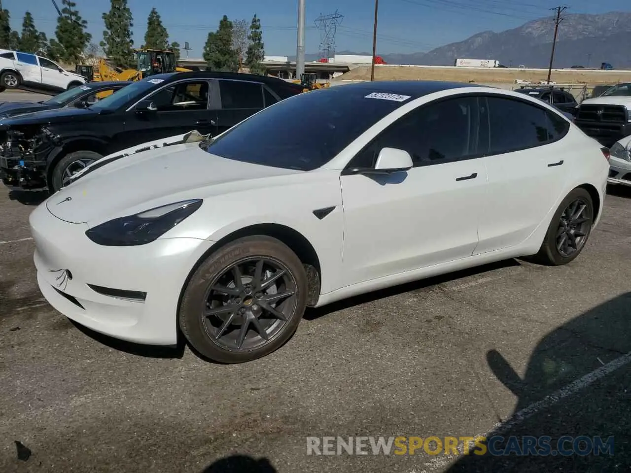 1 Photograph of a damaged car 5YJ3E1EA4MF002993 TESLA MODEL 3 2021
