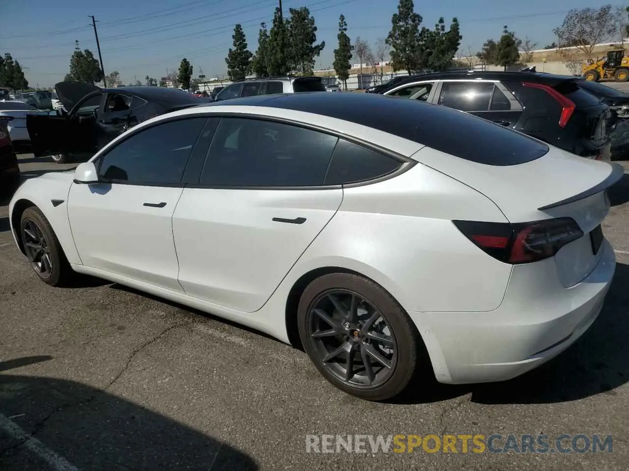 2 Photograph of a damaged car 5YJ3E1EA4MF002993 TESLA MODEL 3 2021
