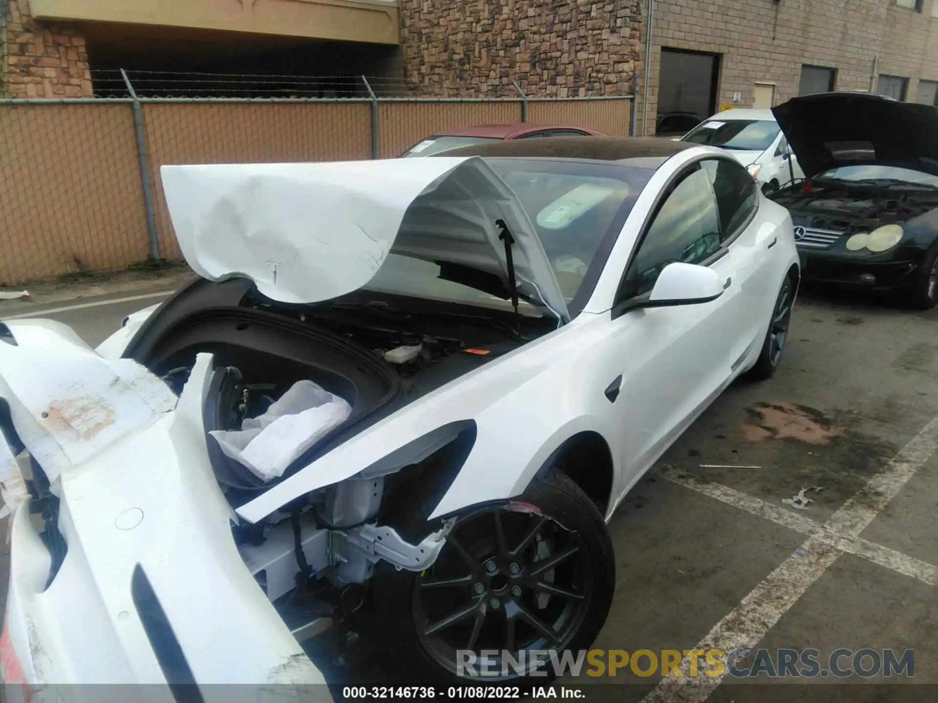 2 Photograph of a damaged car 5YJ3E1EA4MF021561 TESLA MODEL 3 2021