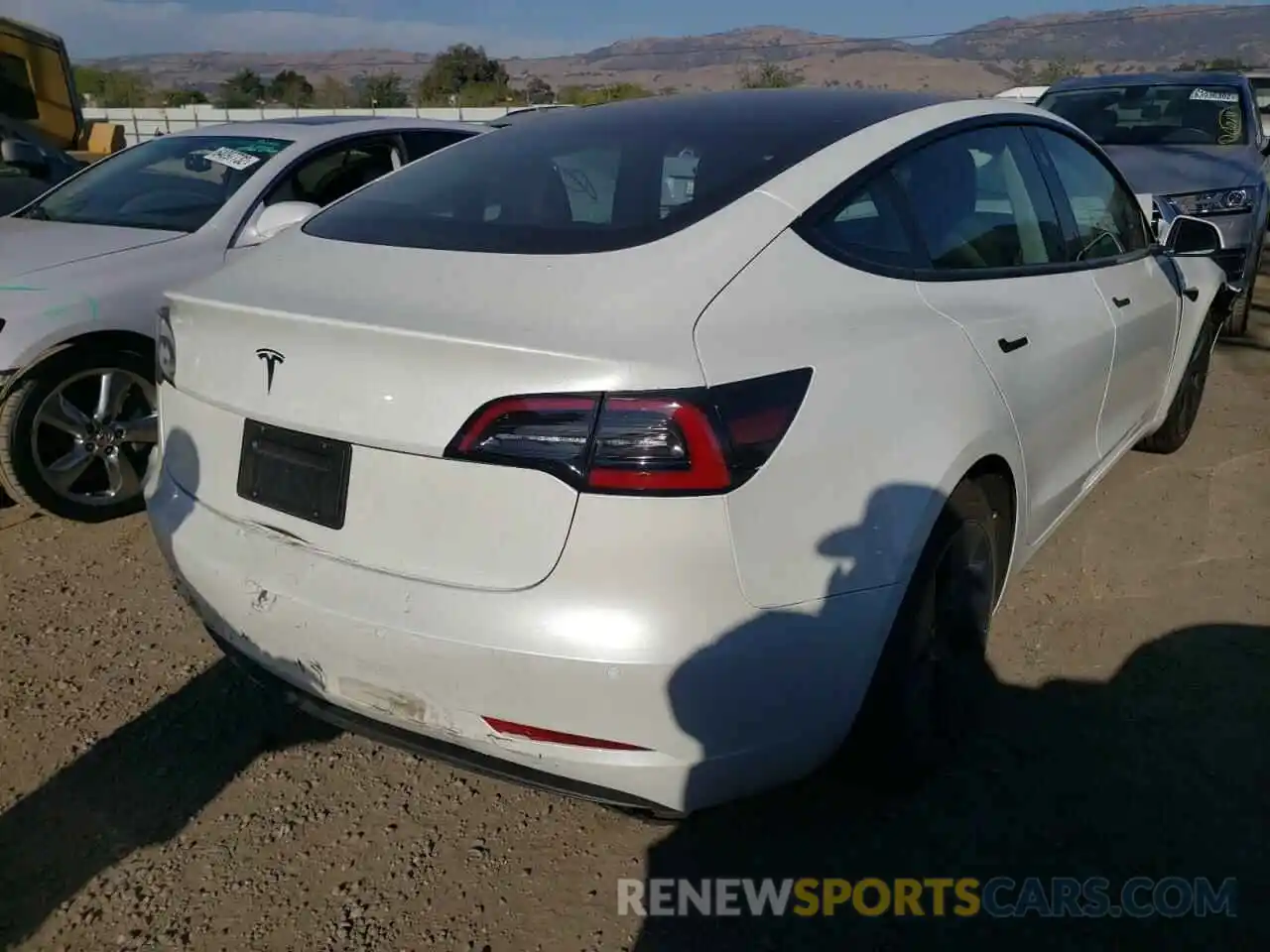 4 Photograph of a damaged car 5YJ3E1EA4MF021625 TESLA MODEL 3 2021