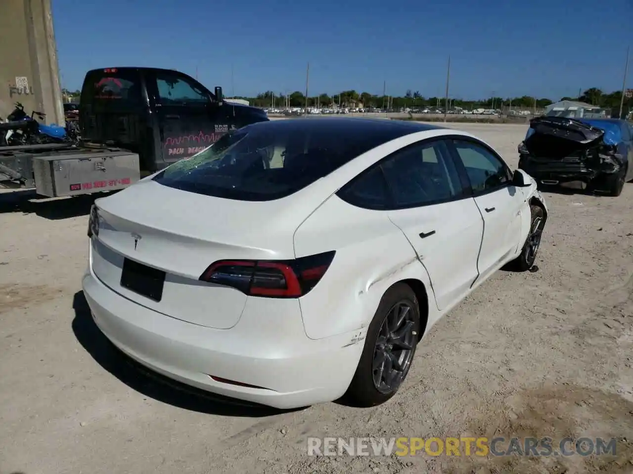 4 Photograph of a damaged car 5YJ3E1EA4MF087141 TESLA MODEL 3 2021