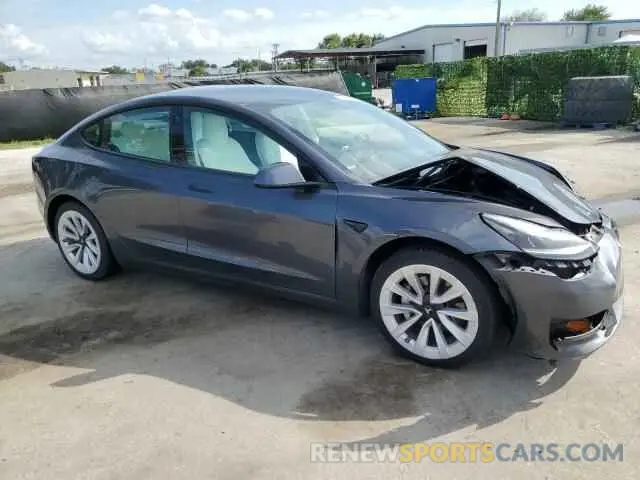 4 Photograph of a damaged car 5YJ3E1EA4MF090587 TESLA MODEL 3 2021