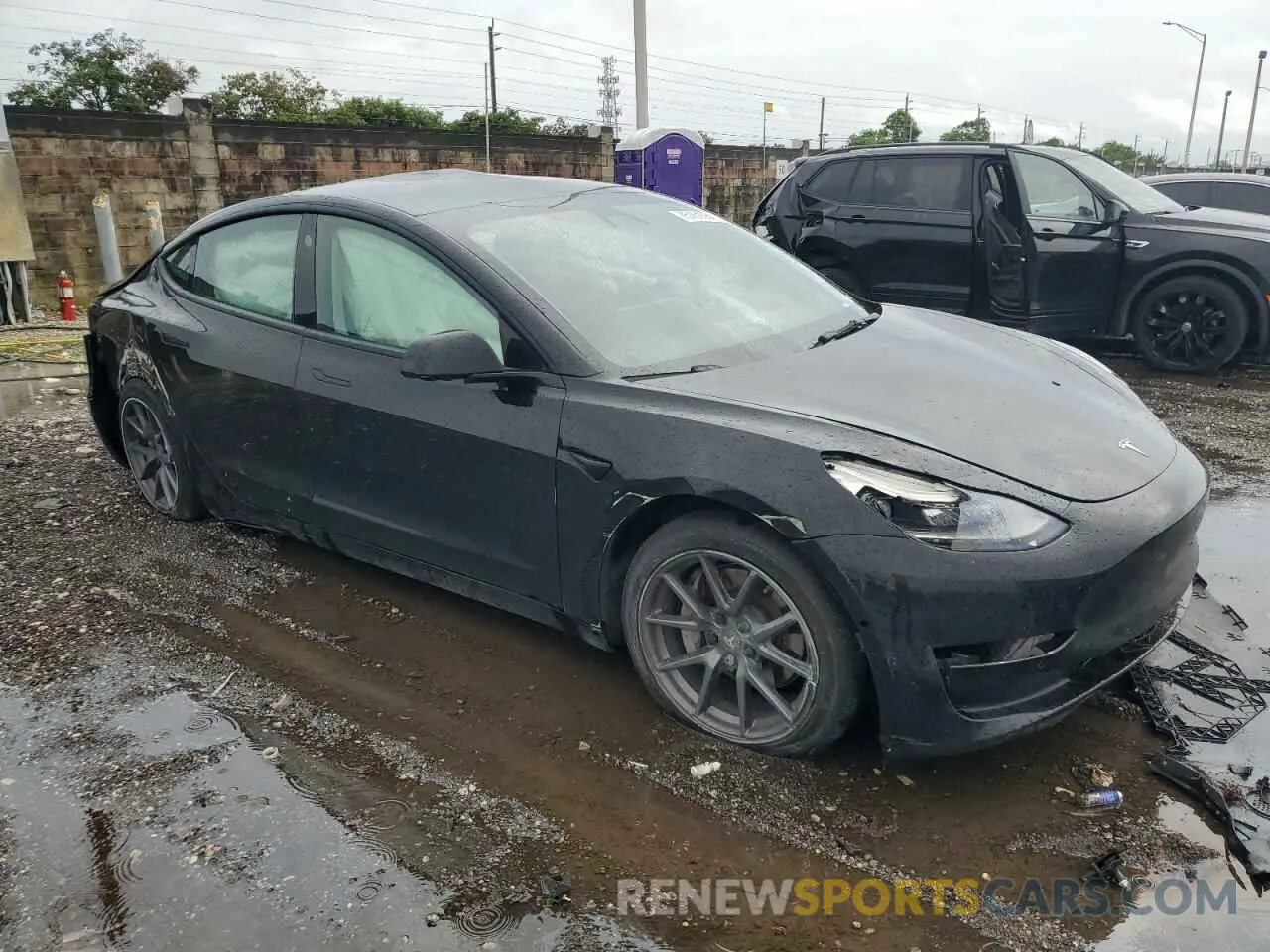 4 Photograph of a damaged car 5YJ3E1EA4MF092274 TESLA MODEL 3 2021