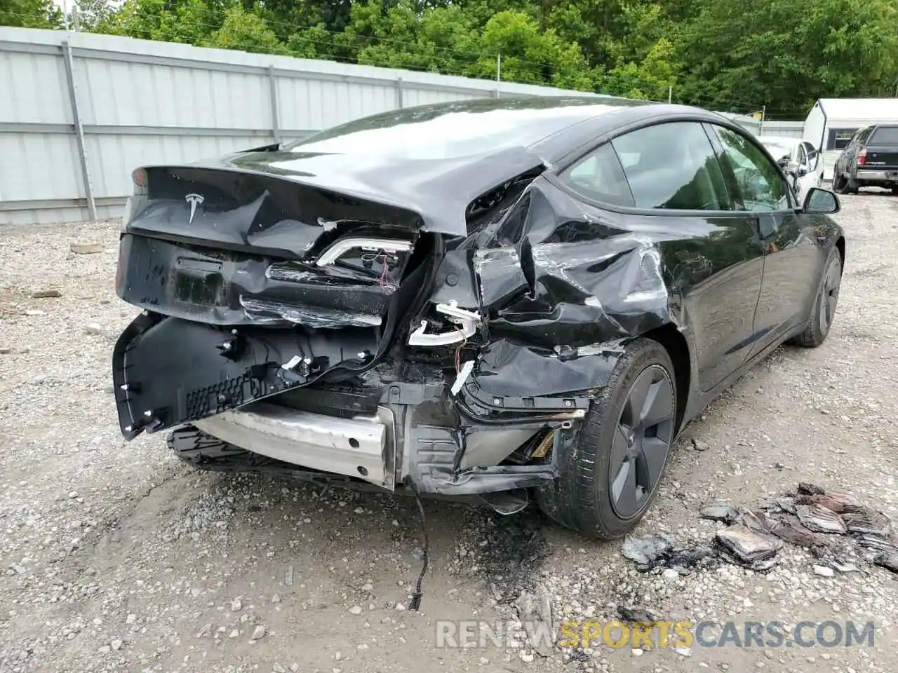 4 Photograph of a damaged car 5YJ3E1EA4MF100597 TESLA MODEL 3 2021