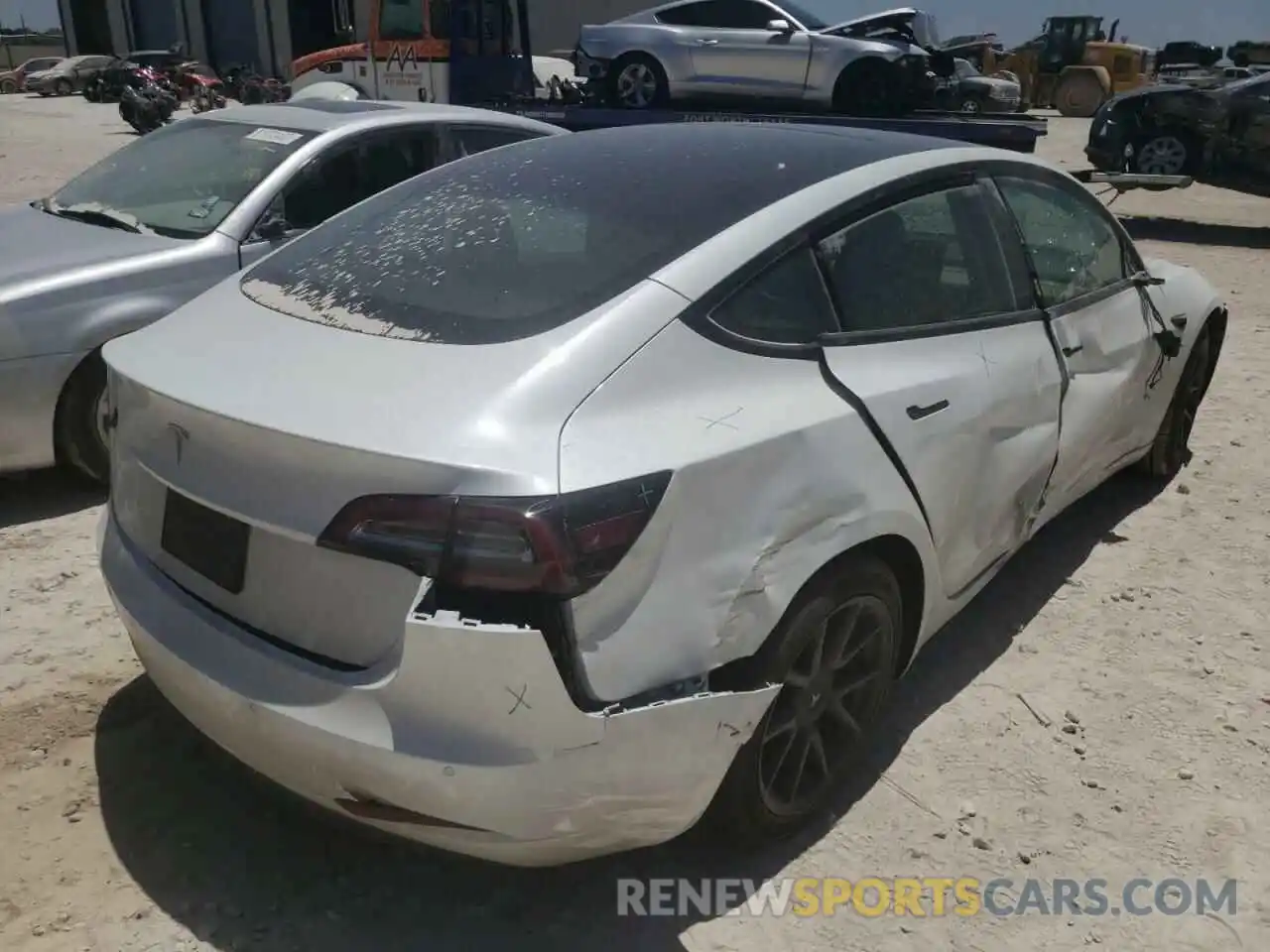 4 Photograph of a damaged car 5YJ3E1EA4MF866622 TESLA MODEL 3 2021