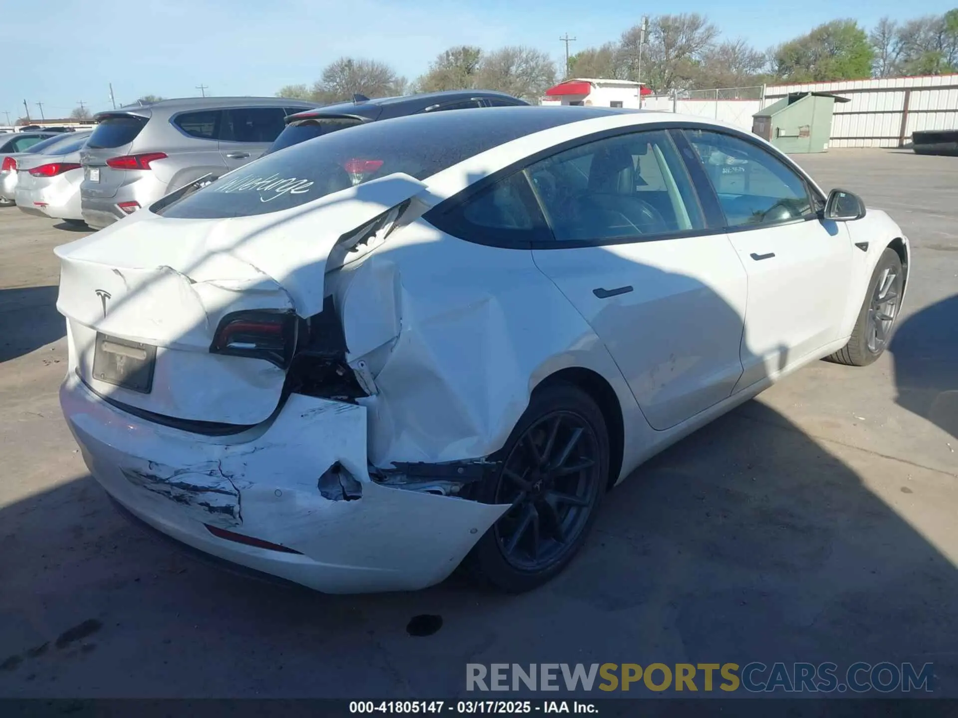 4 Photograph of a damaged car 5YJ3E1EA4MF867169 TESLA MODEL 3 2021