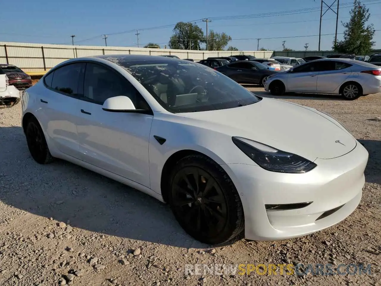 4 Photograph of a damaged car 5YJ3E1EA4MF870413 TESLA MODEL 3 2021