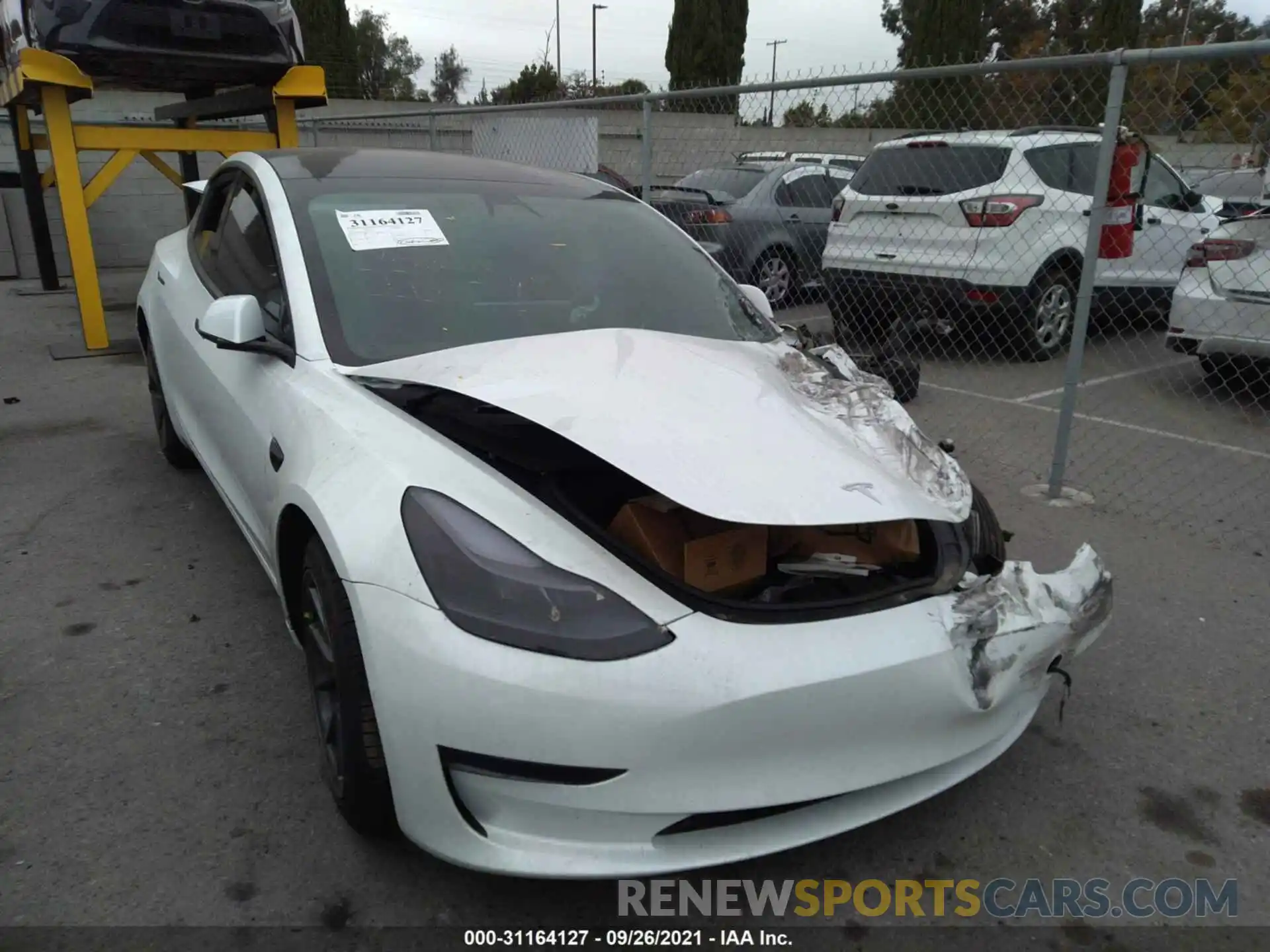 1 Photograph of a damaged car 5YJ3E1EA4MF873909 TESLA MODEL 3 2021