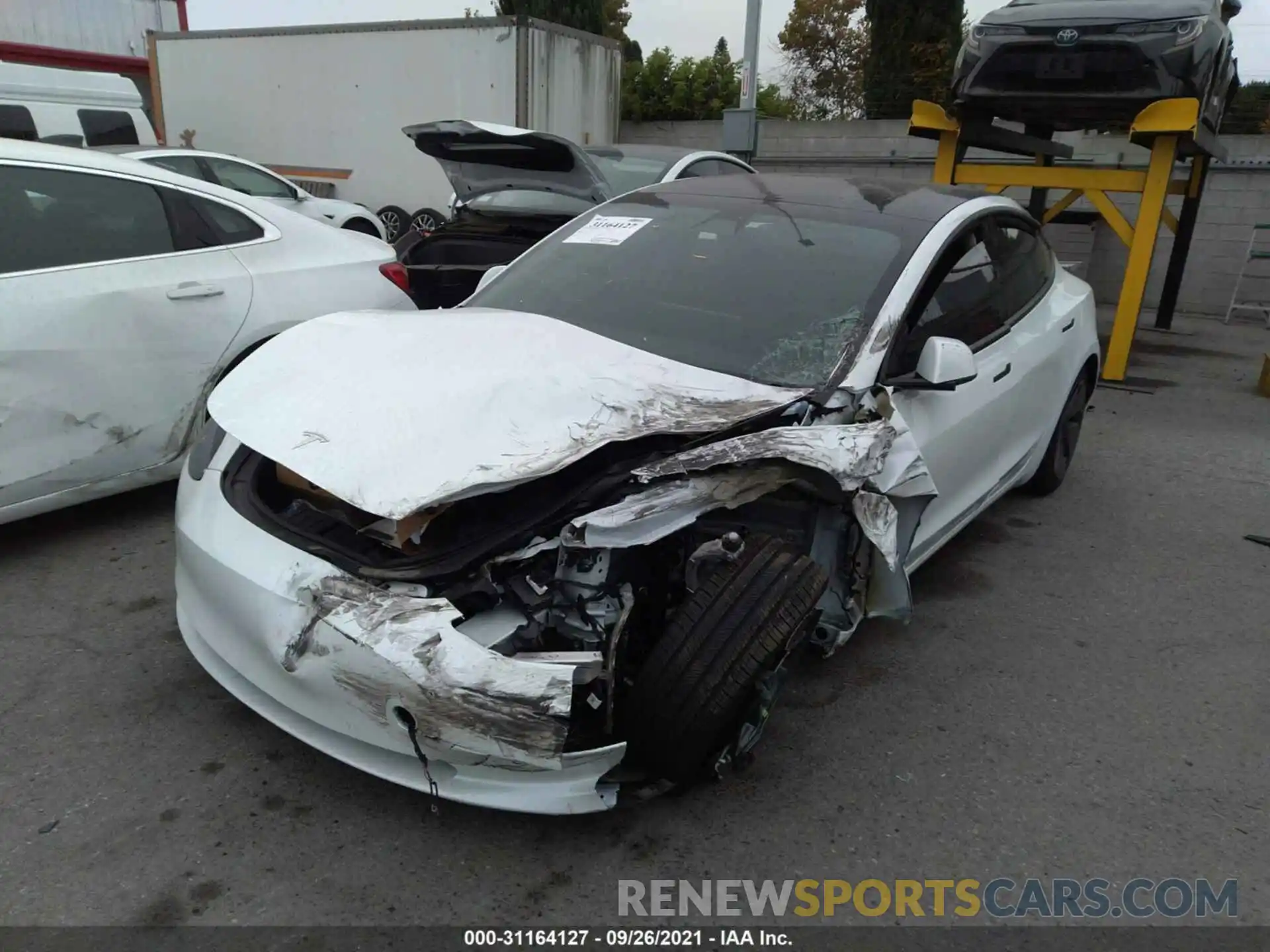 2 Photograph of a damaged car 5YJ3E1EA4MF873909 TESLA MODEL 3 2021