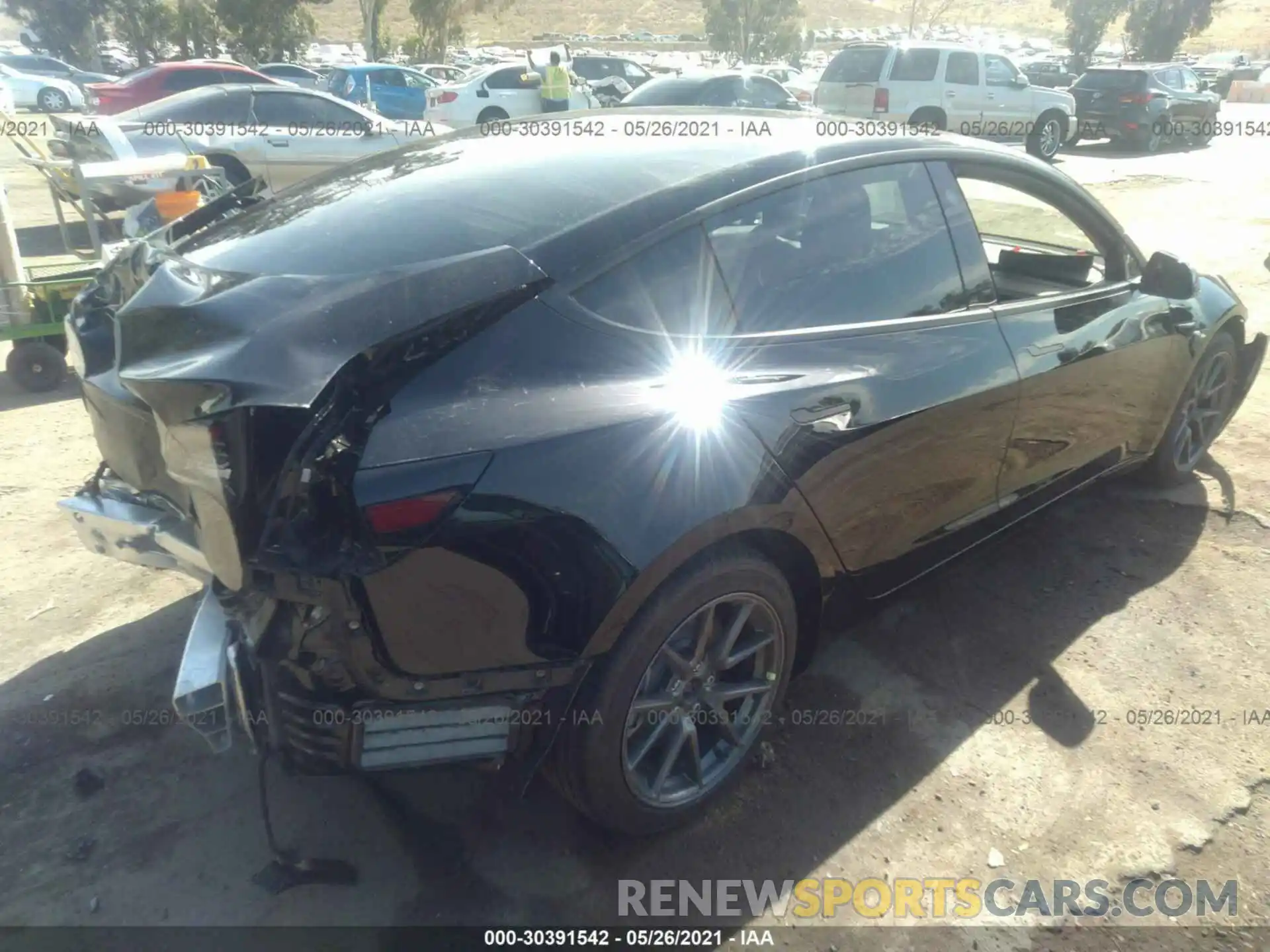 4 Photograph of a damaged car 5YJ3E1EA4MF875532 TESLA MODEL 3 2021