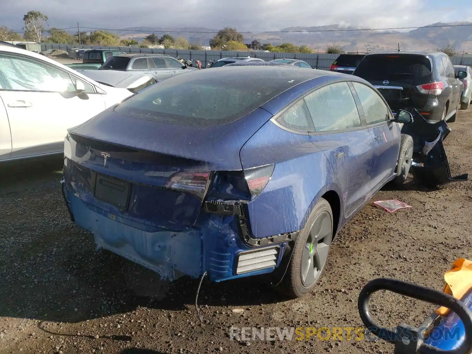 4 Photograph of a damaged car 5YJ3E1EA4MF877510 TESLA MODEL 3 2021