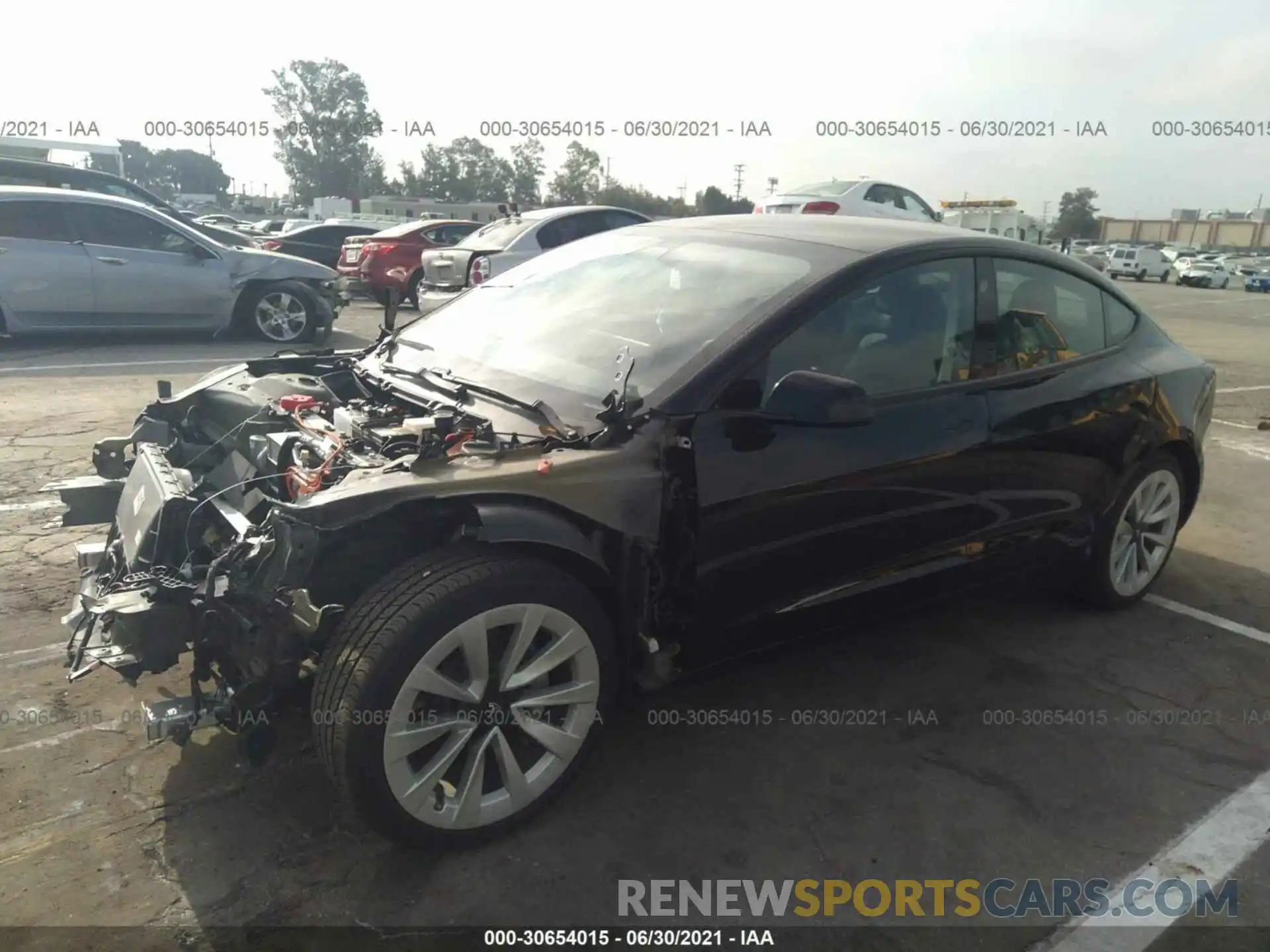 2 Photograph of a damaged car 5YJ3E1EA4MF908075 TESLA MODEL 3 2021