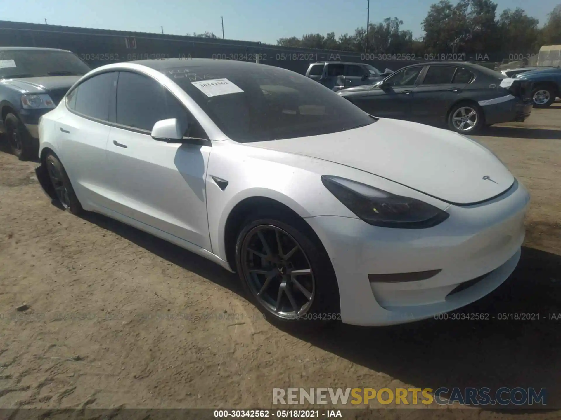 1 Photograph of a damaged car 5YJ3E1EA4MF928858 TESLA MODEL 3 2021