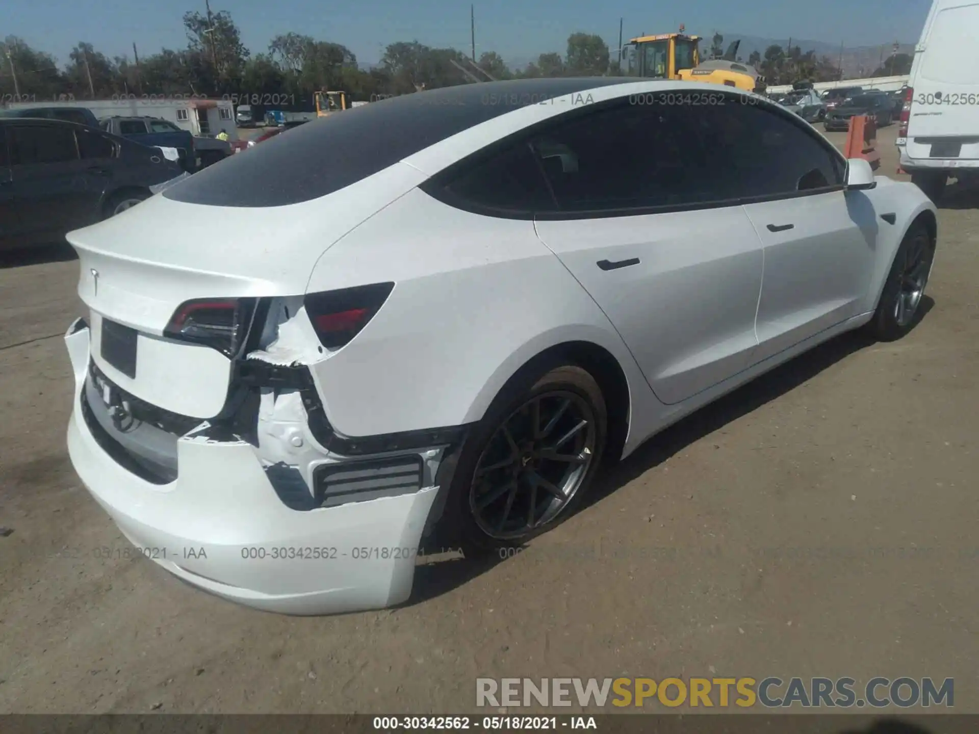 4 Photograph of a damaged car 5YJ3E1EA4MF928858 TESLA MODEL 3 2021