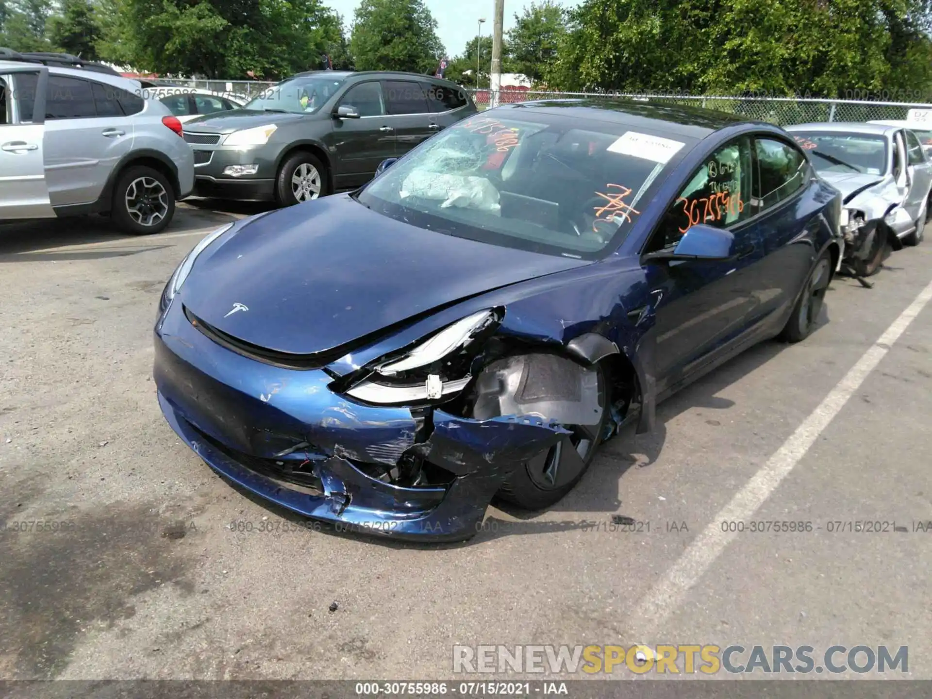 2 Photograph of a damaged car 5YJ3E1EA4MF976439 TESLA MODEL 3 2021