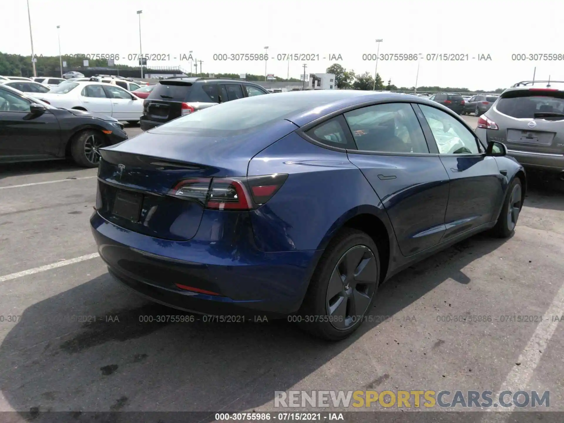 4 Photograph of a damaged car 5YJ3E1EA4MF976439 TESLA MODEL 3 2021