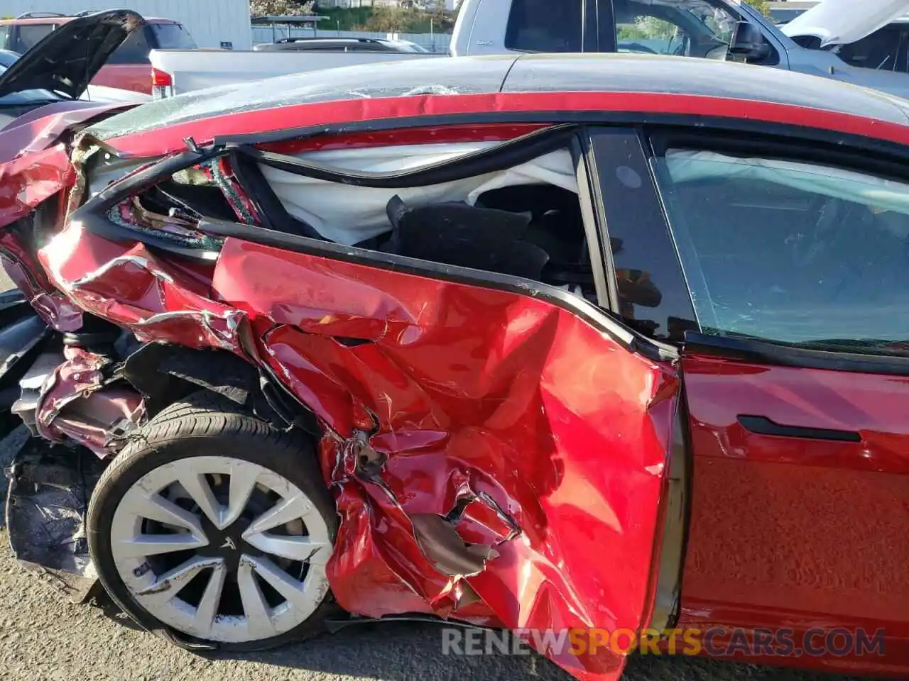 9 Photograph of a damaged car 5YJ3E1EA4MF977719 TESLA MODEL 3 2021