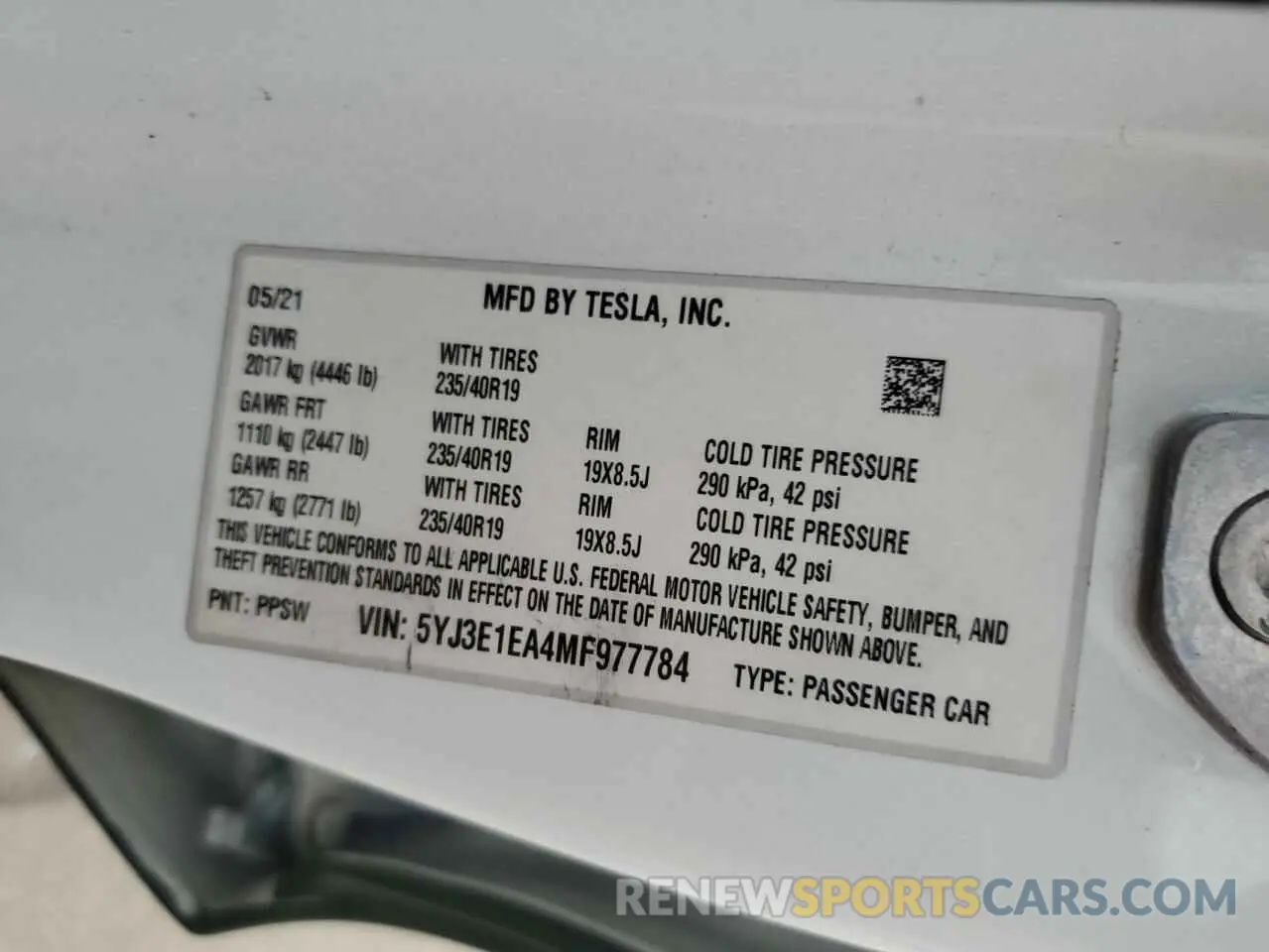 12 Photograph of a damaged car 5YJ3E1EA4MF977784 TESLA MODEL 3 2021