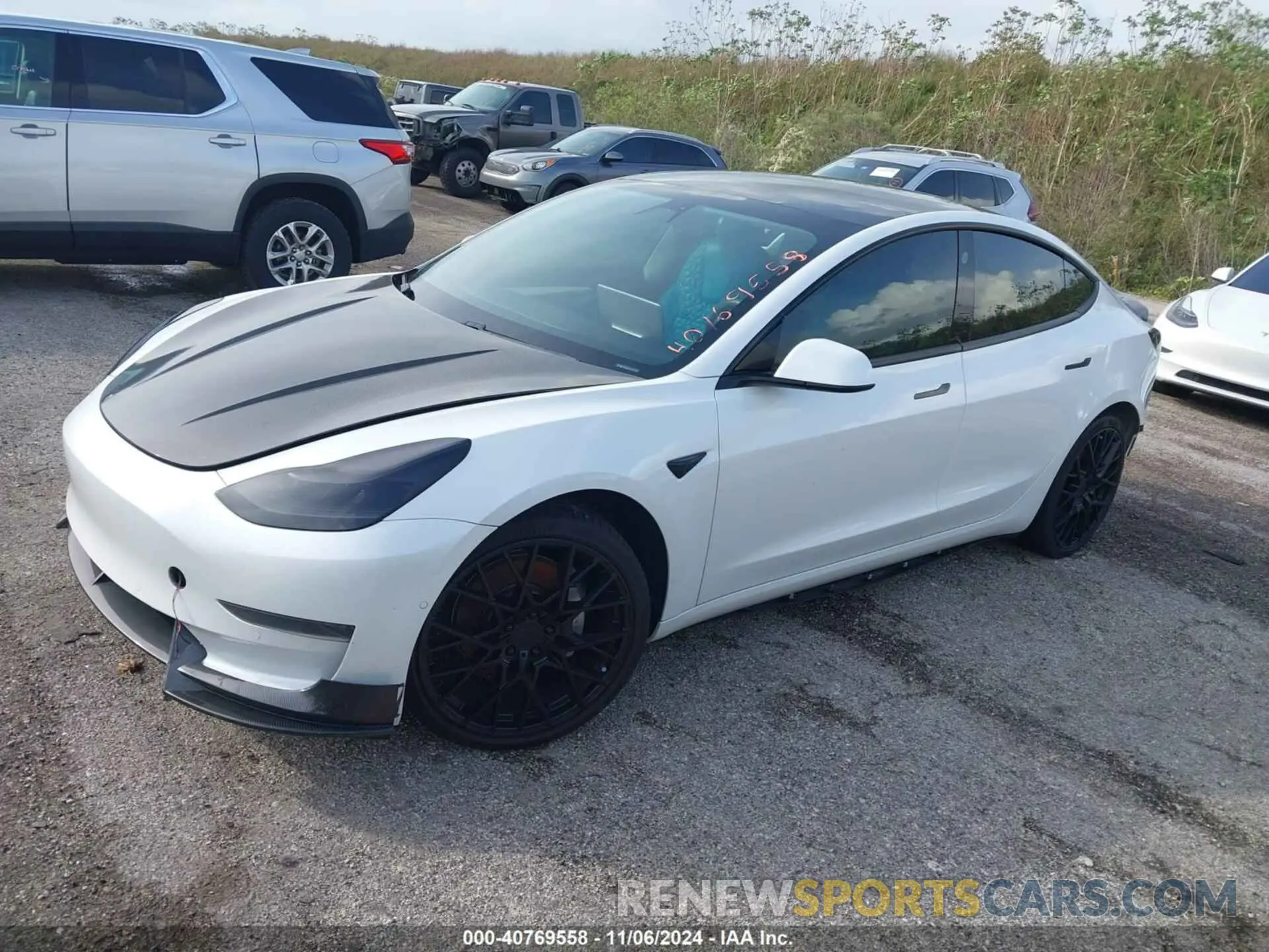 2 Photograph of a damaged car 5YJ3E1EA4MF978448 TESLA MODEL 3 2021
