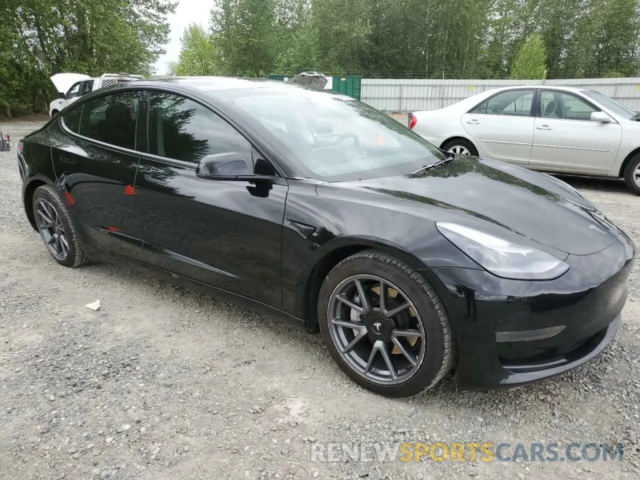 4 Photograph of a damaged car 5YJ3E1EA5MF029703 TESLA MODEL 3 2021