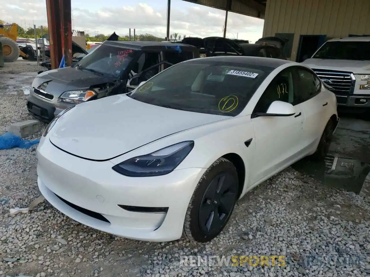 2 Photograph of a damaged car 5YJ3E1EA5MF058411 TESLA MODEL 3 2021