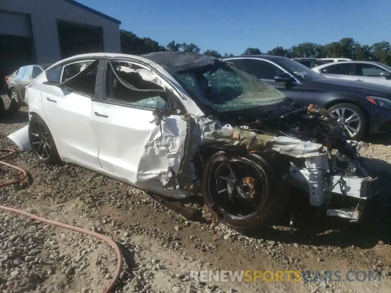 1 Photograph of a damaged car 5YJ3E1EA5MF060577 TESLA MODEL 3 2021