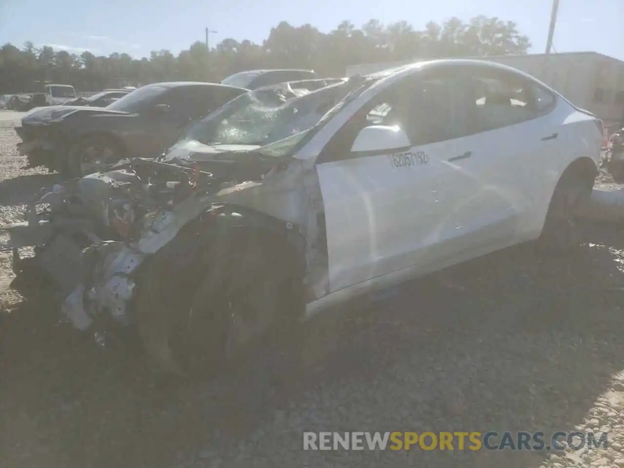 2 Photograph of a damaged car 5YJ3E1EA5MF060577 TESLA MODEL 3 2021