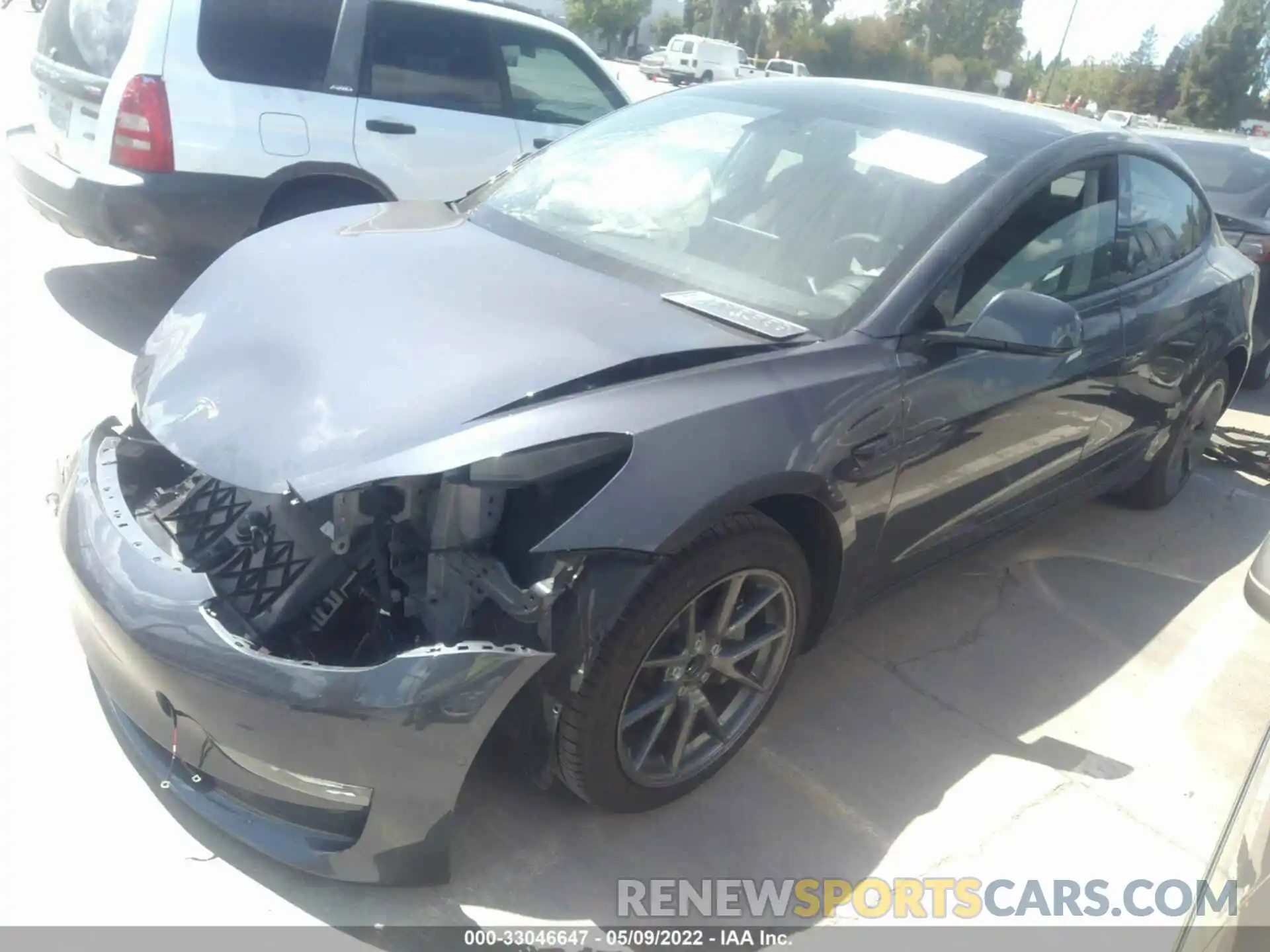 2 Photograph of a damaged car 5YJ3E1EA5MF071093 TESLA MODEL 3 2021