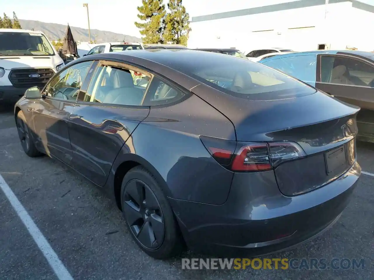 2 Photograph of a damaged car 5YJ3E1EA5MF074706 TESLA MODEL 3 2021