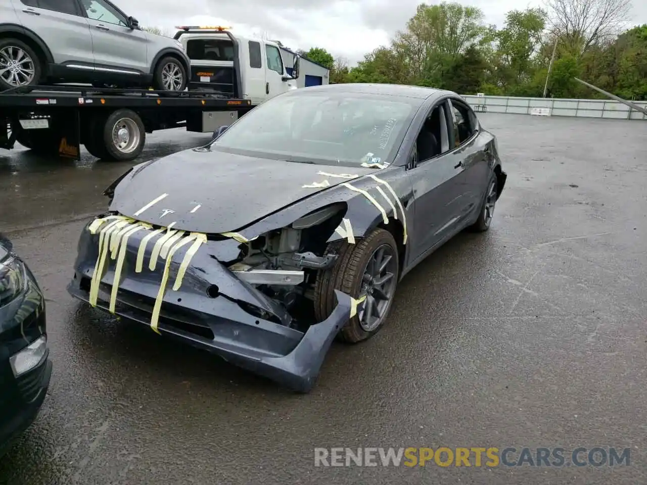 2 Photograph of a damaged car 5YJ3E1EA5MF086001 TESLA MODEL 3 2021