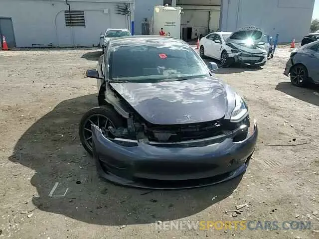 11 Photograph of a damaged car 5YJ3E1EA5MF087892 TESLA MODEL 3 2021