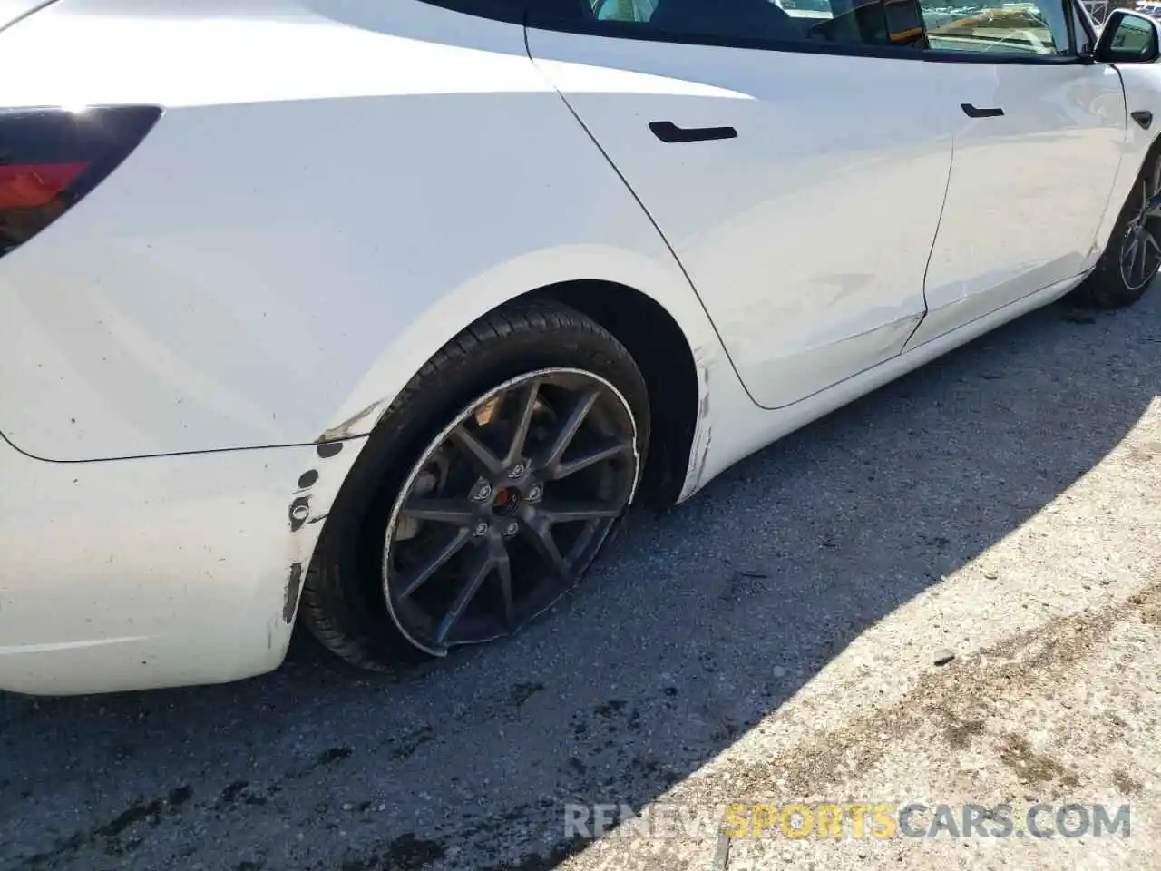 9 Photograph of a damaged car 5YJ3E1EA5MF092204 TESLA MODEL 3 2021