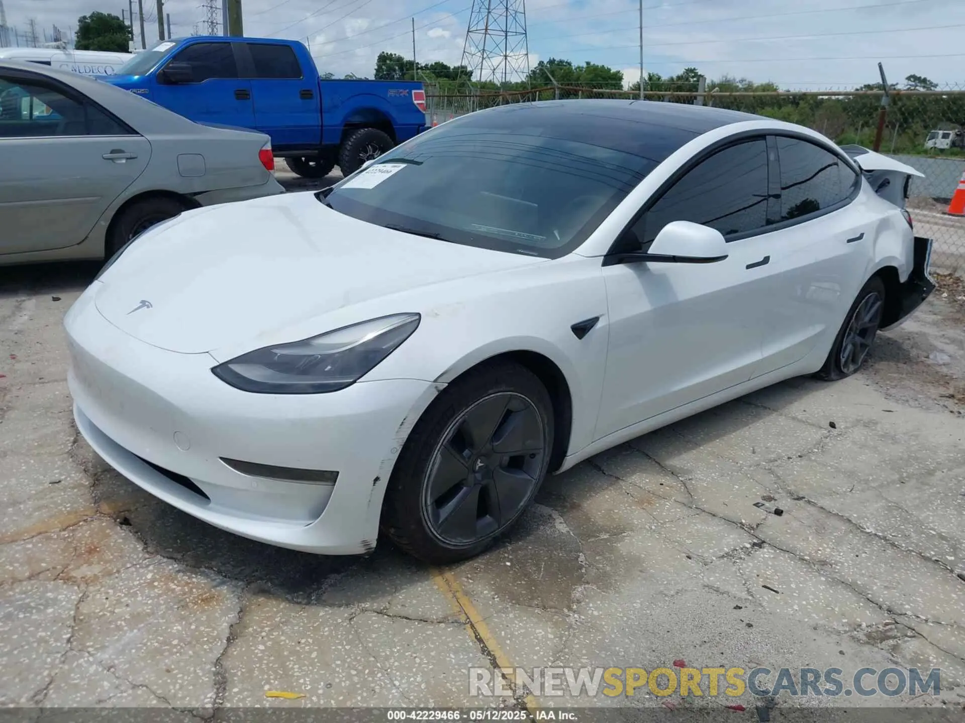 2 Photograph of a damaged car 5YJ3E1EA5MF099704 TESLA MODEL 3 2021
