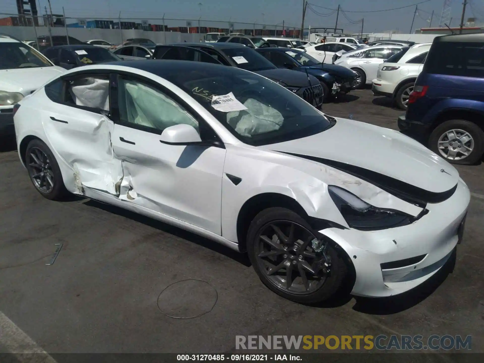 1 Photograph of a damaged car 5YJ3E1EA5MF867665 TESLA MODEL 3 2021