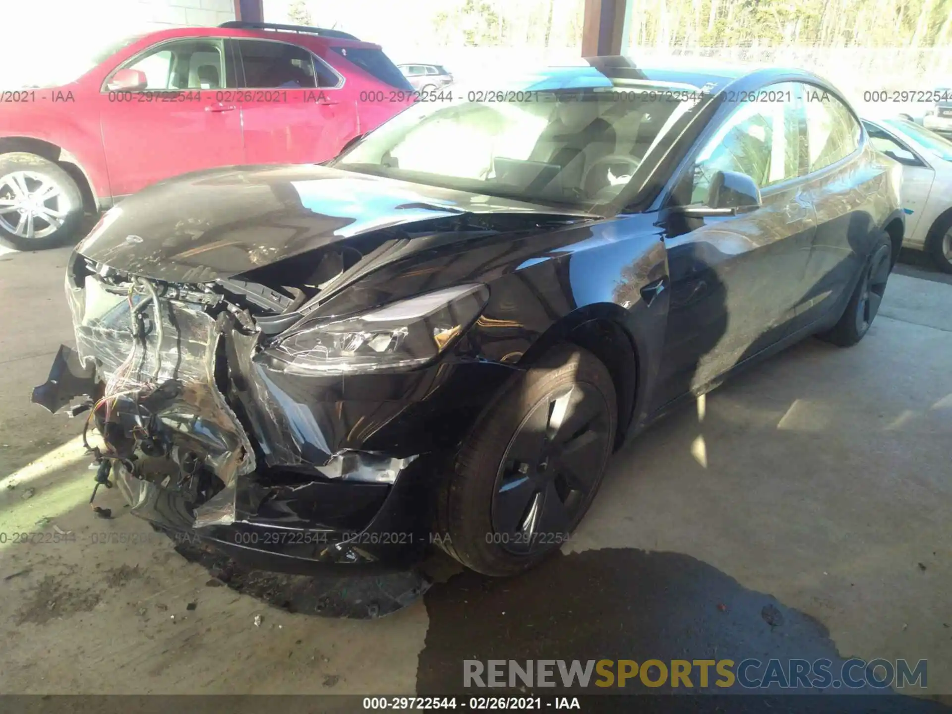 2 Photograph of a damaged car 5YJ3E1EA5MF870663 TESLA MODEL 3 2021