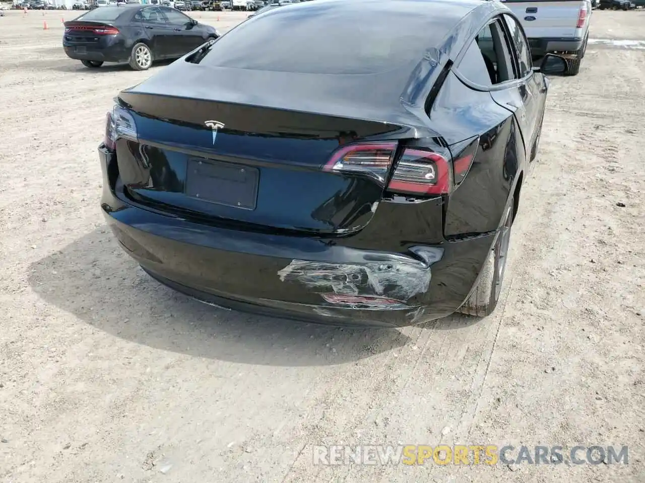 9 Photograph of a damaged car 5YJ3E1EA5MF911664 TESLA MODEL 3 2021