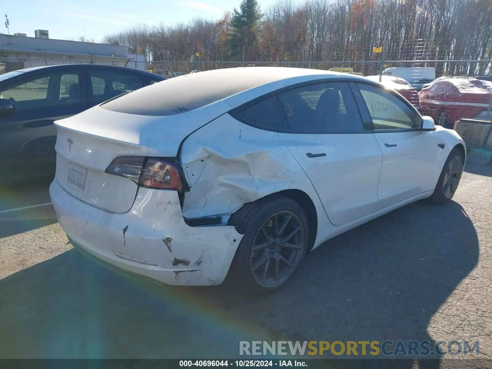 4 Photograph of a damaged car 5YJ3E1EA5MF919859 TESLA MODEL 3 2021
