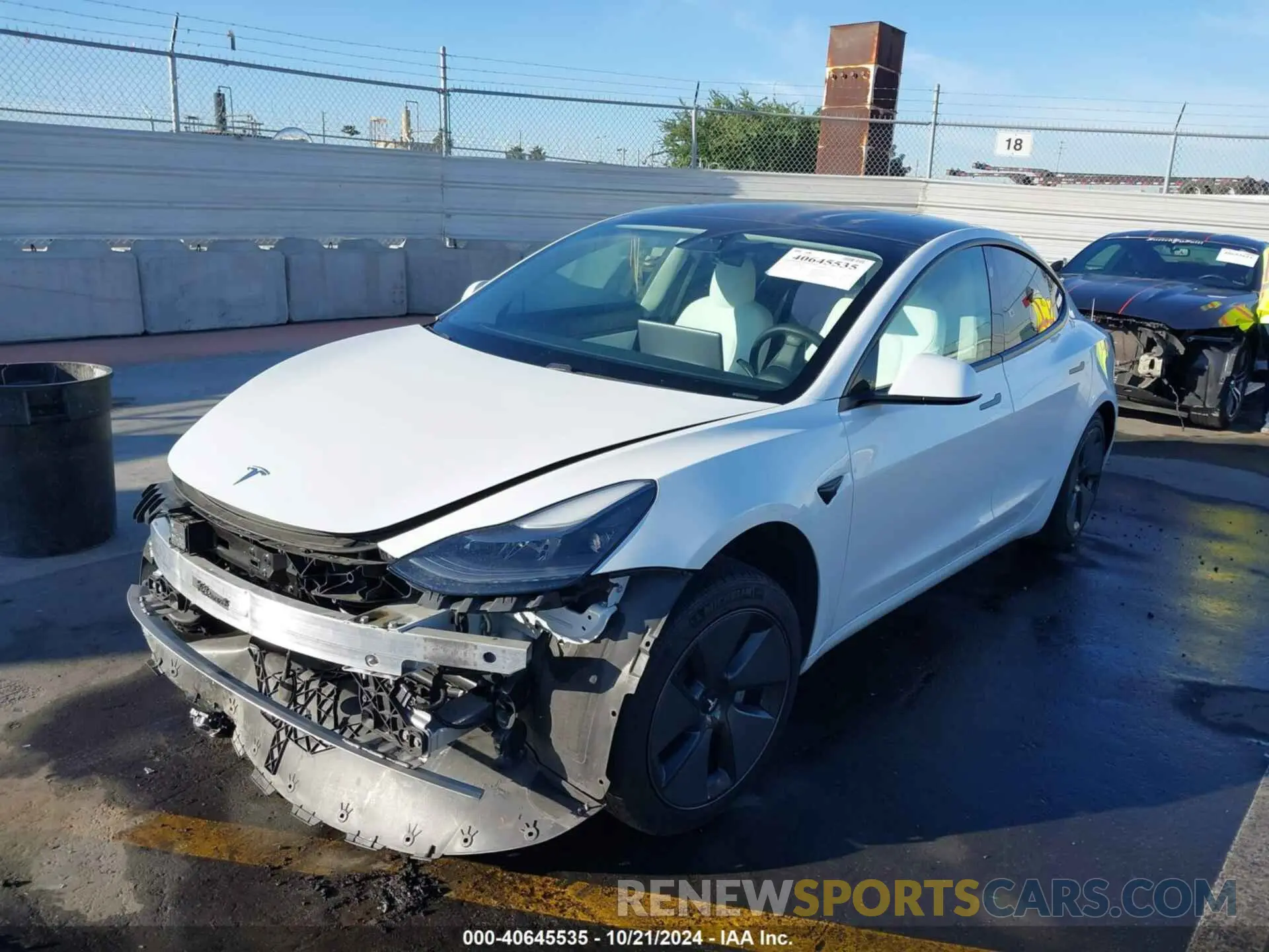 2 Photograph of a damaged car 5YJ3E1EA5MF942994 TESLA MODEL 3 2021