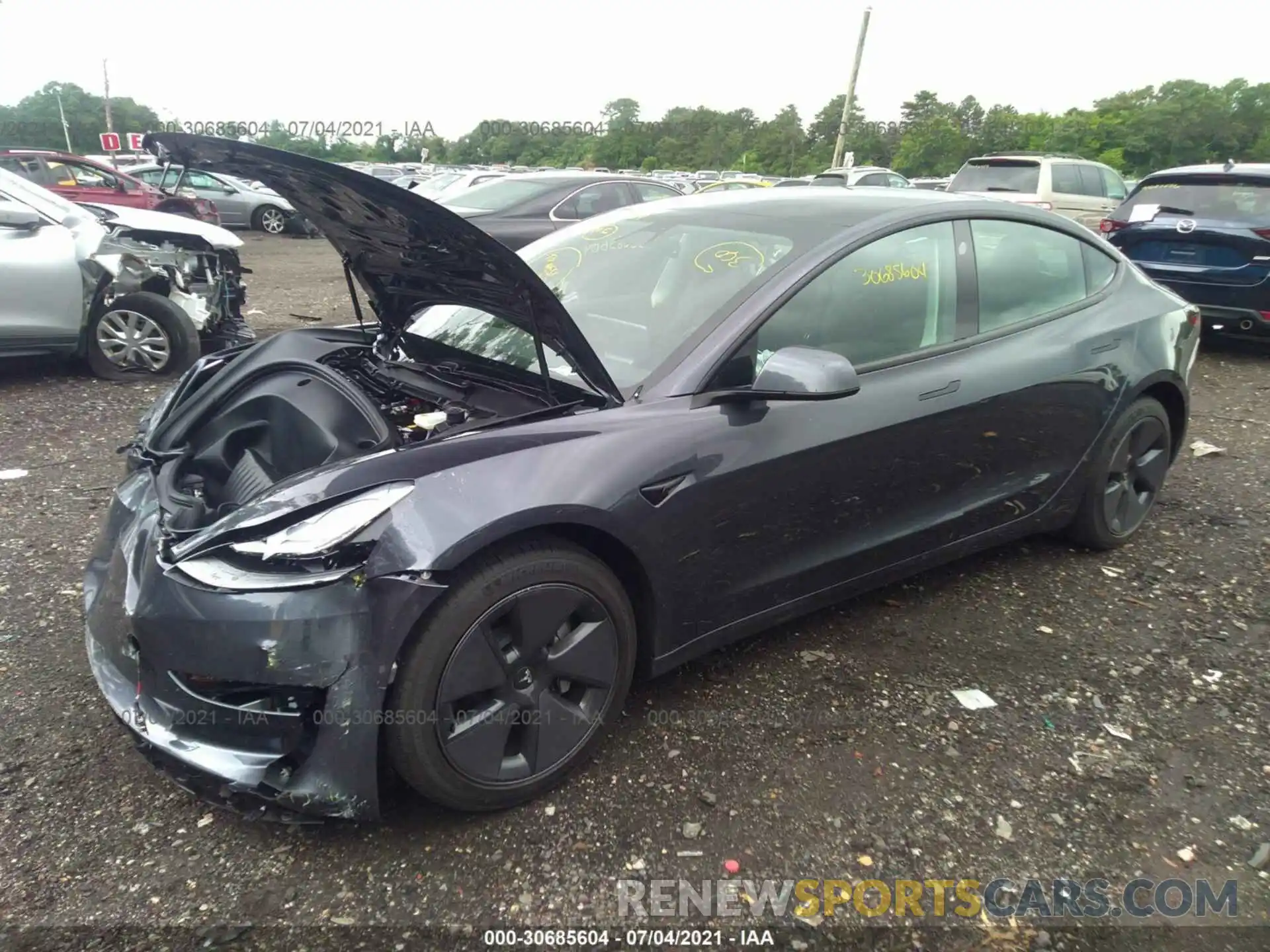 2 Photograph of a damaged car 5YJ3E1EA5MF976708 TESLA MODEL 3 2021