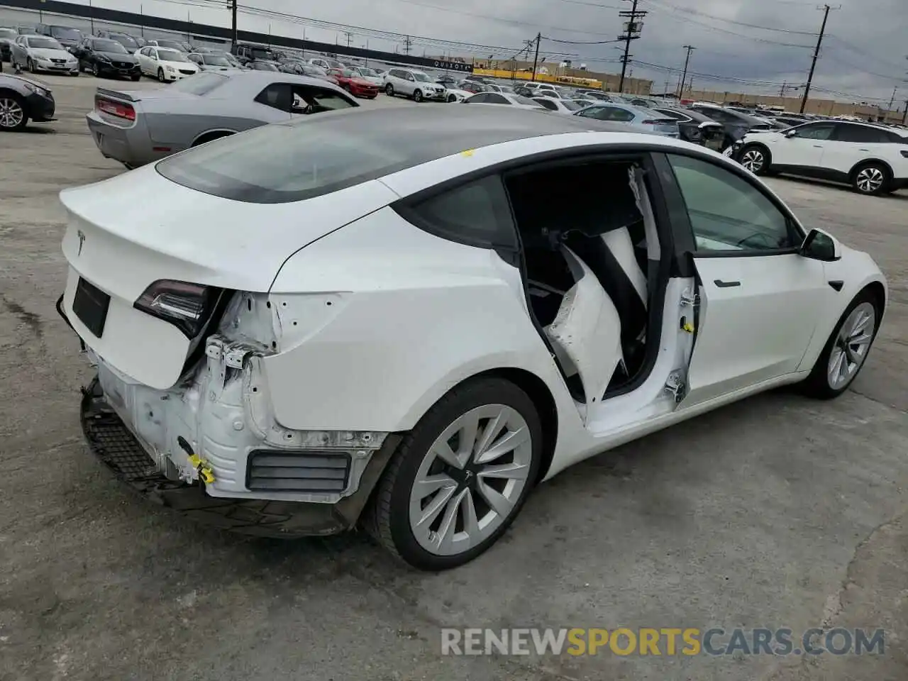 3 Photograph of a damaged car 5YJ3E1EA5MF989748 TESLA MODEL 3 2021