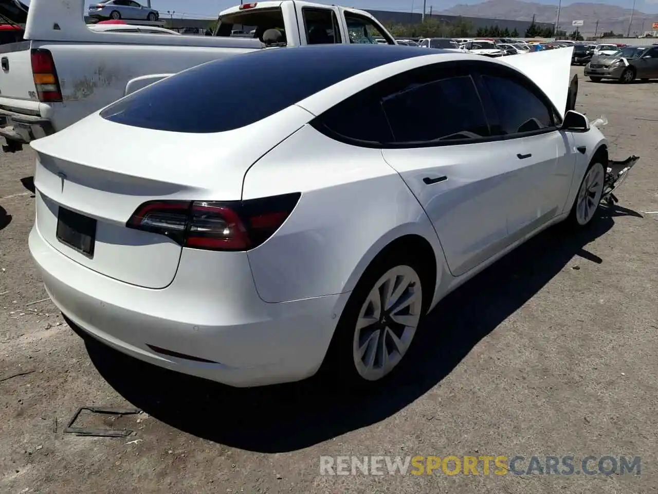 4 Photograph of a damaged car 5YJ3E1EA5MF994397 TESLA MODEL 3 2021