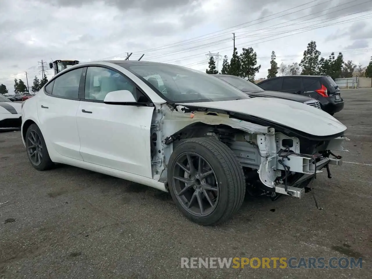 4 Photograph of a damaged car 5YJ3E1EA6MF066064 TESLA MODEL 3 2021