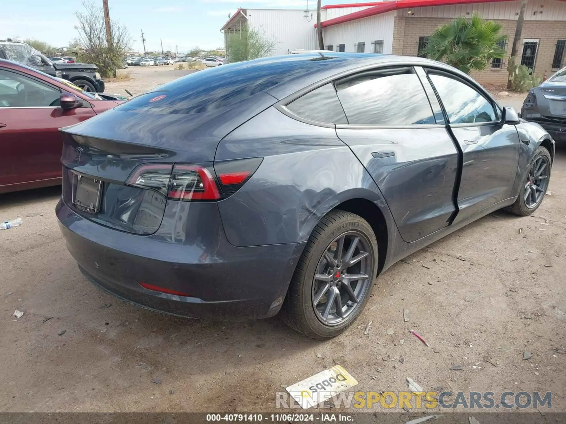 4 Photograph of a damaged car 5YJ3E1EA6MF097055 TESLA MODEL 3 2021