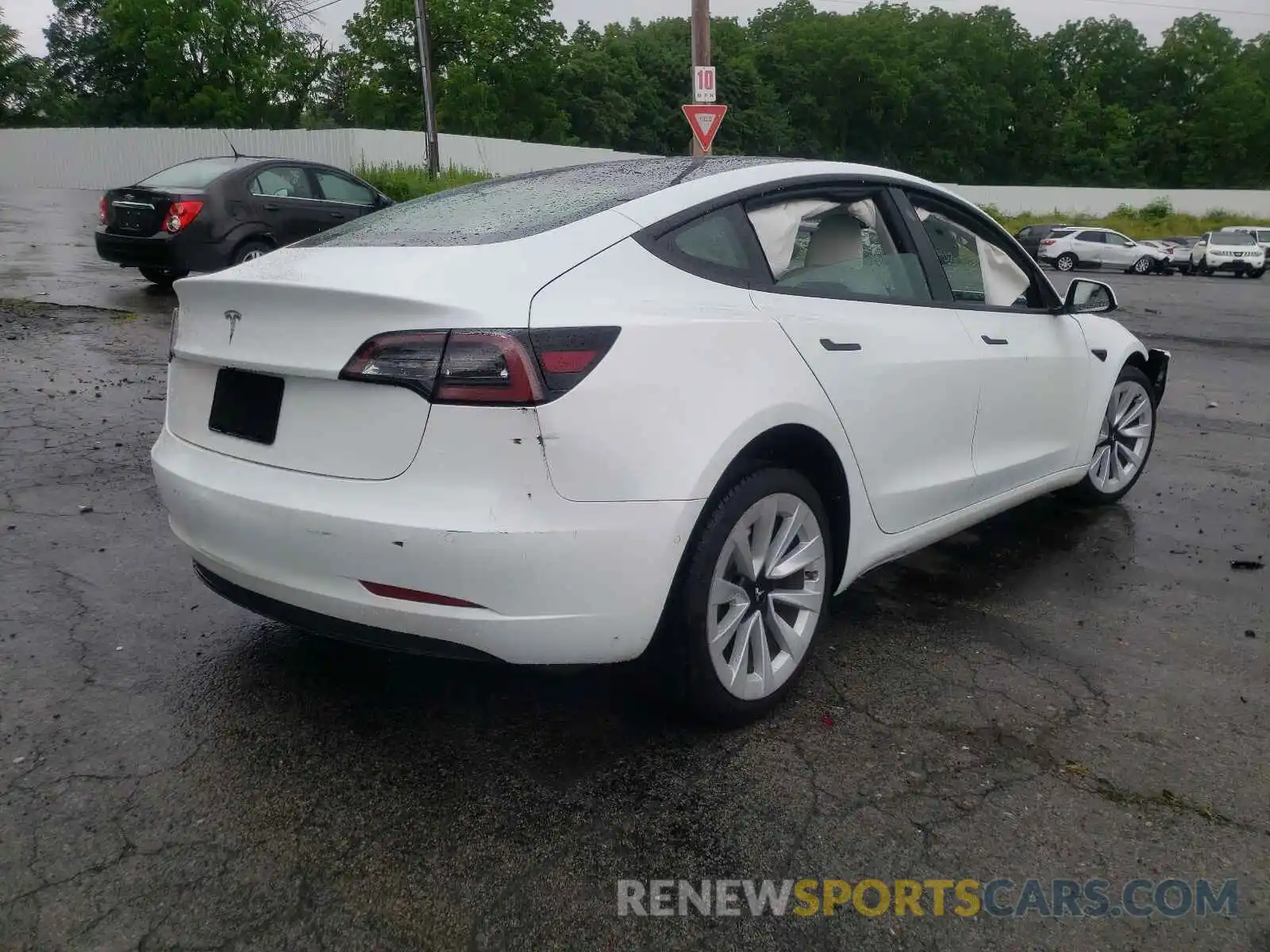 4 Photograph of a damaged car 5YJ3E1EA6MF851314 TESLA MODEL 3 2021